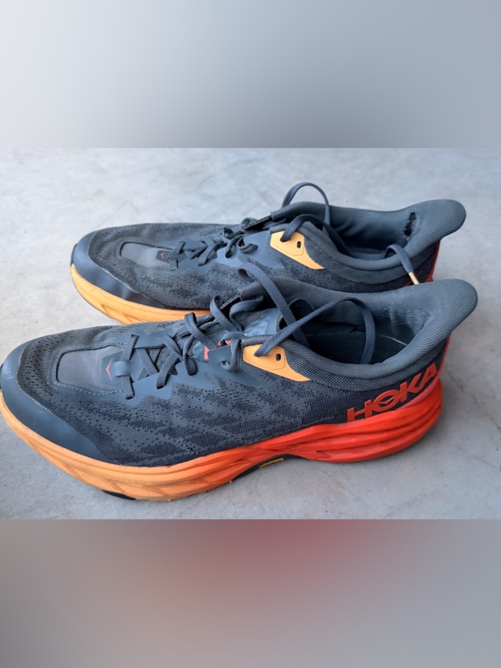 Hoka One One Dark Gray and Orange Gradient Running Sneakers. Size mens 11D.